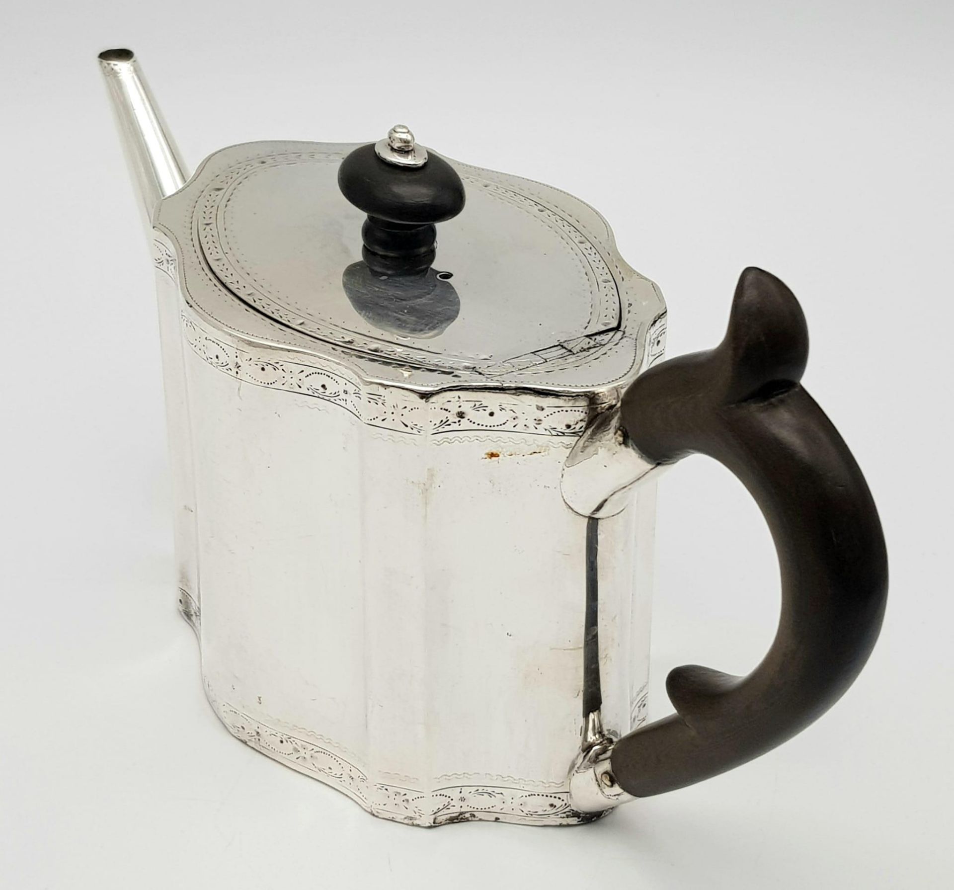 A 1785 Hester Bateman George III Silver Teapot. Oval form with empty cartouche to side. Minimalist - Image 3 of 11