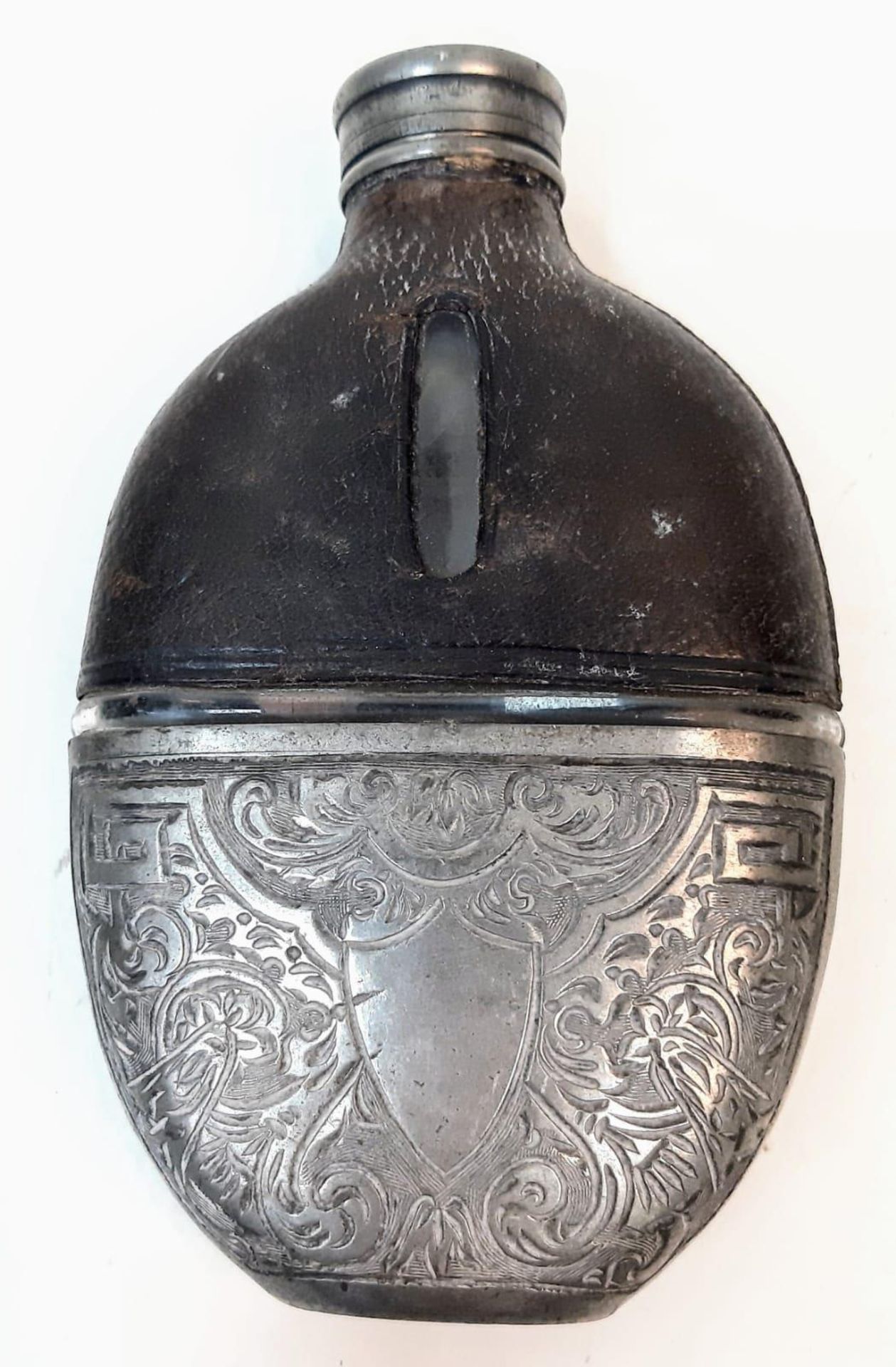 AN ANTIQUE HIP FLASK WITH REMOVABLE CUP REVEALING A GLASS BOTTOM AND HAVING LEATHER SHOULDERS AND - Image 3 of 7