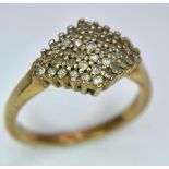 A Vintage 9K Yellow Gold Diamond Cluster Ring. Size J. 2.54g total weight.