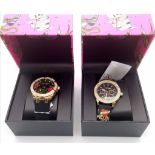 Two Ed Hardy Decorative Quartz Ladies Watches. Both in excellent condition in original boxes. One in