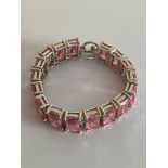Fabulous SILVER and ROSE QUARTZ PANEL BRACELET. Having 17 Emerald Cut Gemstones set and mounted with