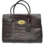 A Mulberry Chocolate 'Bayswater' Handbag. Croc embossed leather exterior with gold-toned hardware,