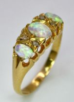 A Mesmerising Antique 18K Yellow Gold, Opal and Diamond Ring. Three beautiful colour-play opals