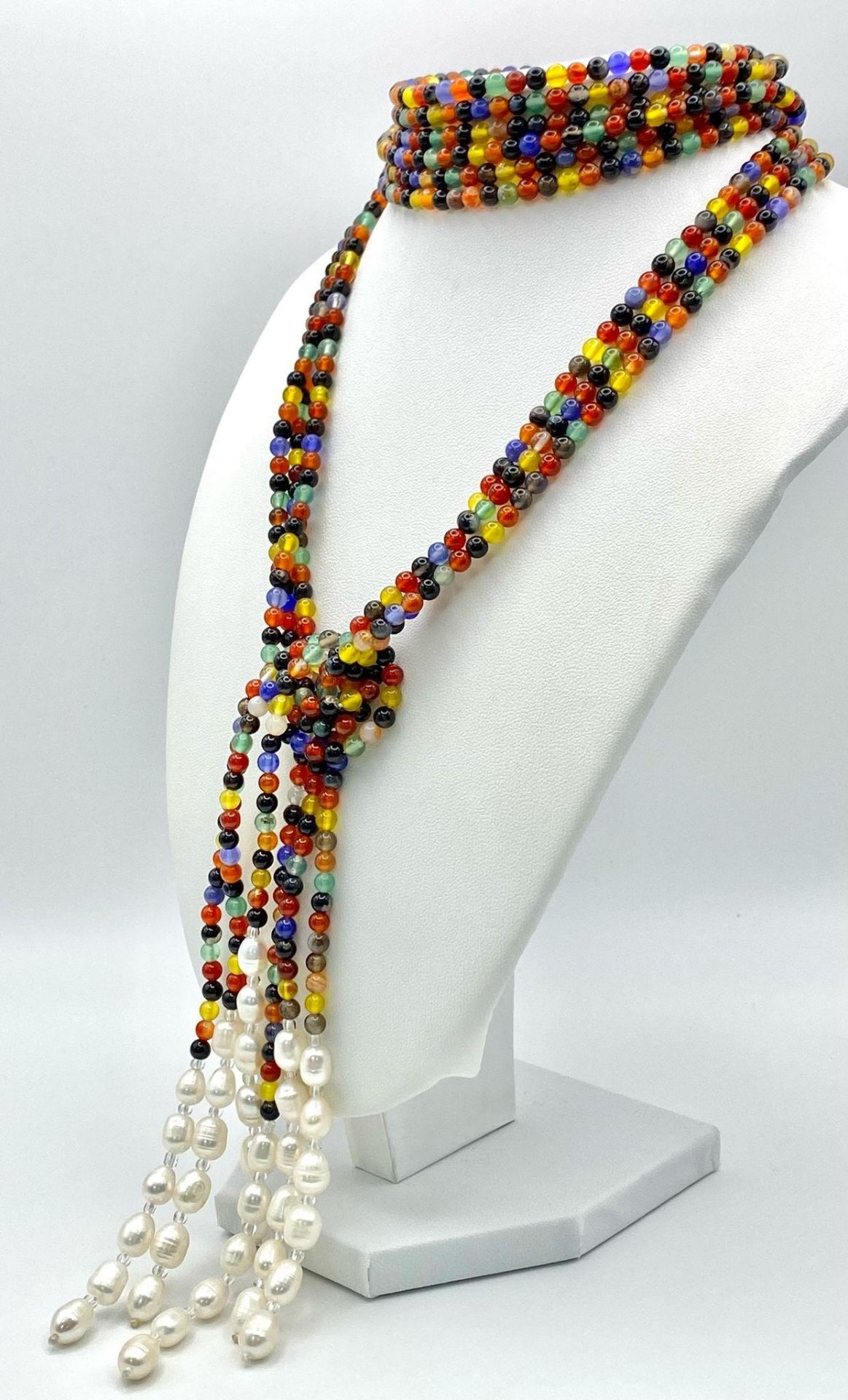 A very interesting necklace consisting of three very long (125 cm) strands of multicoloured beads - Image 4 of 5