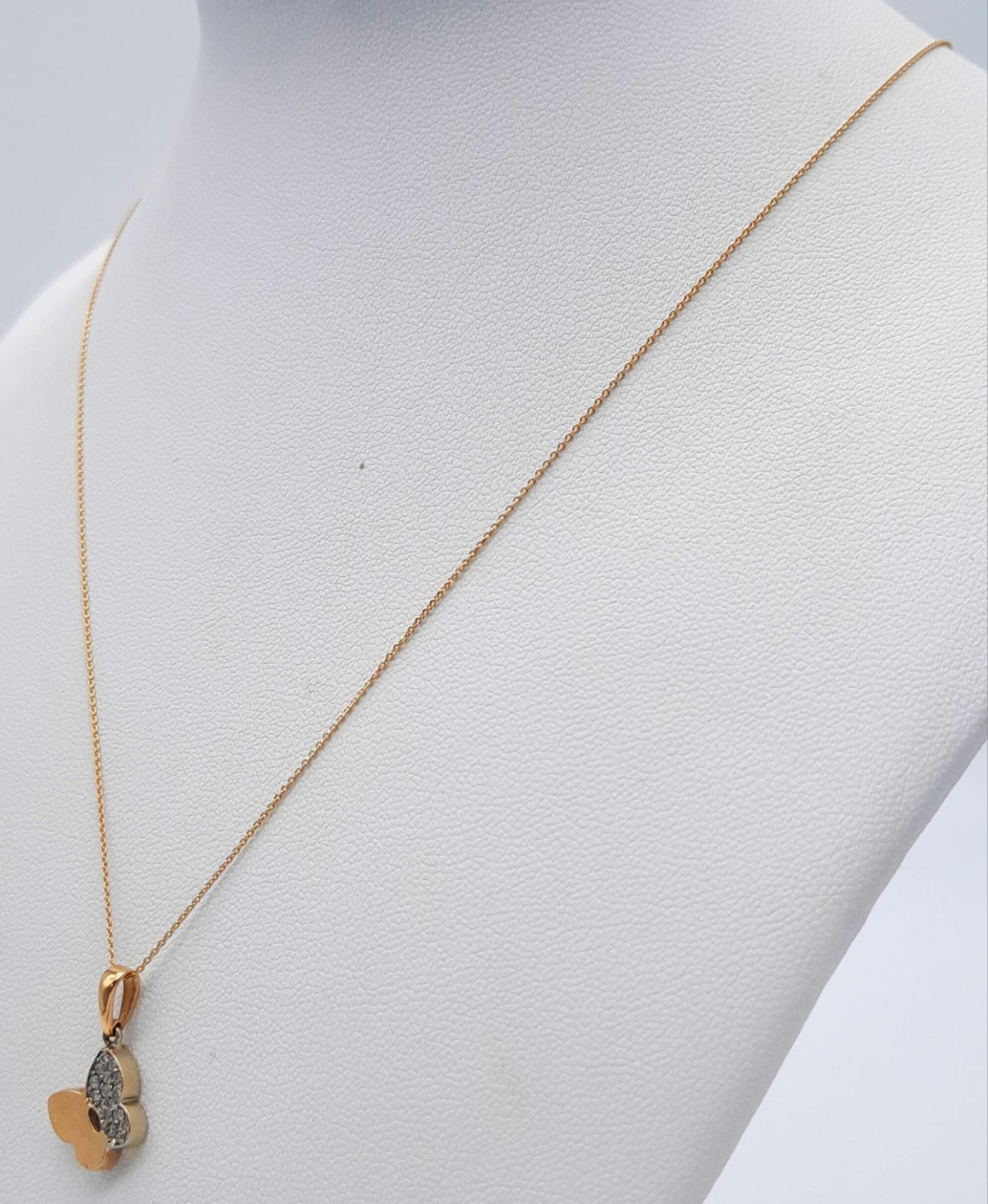 An 18K Gold Butterfly Pendant on an 18K Gold Disappearing Necklace. 2cm and 44cm. 2.4g total weight. - Image 3 of 5