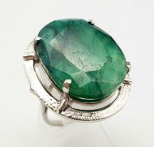 An Oval Shaped Brazilian Emerald 925 Silver Ring. Size P. Weight - 18.80g. Comes in a presentation