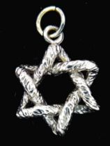 A 9K White Gold Star of David Pendant. 2cm. 1.5g weight.