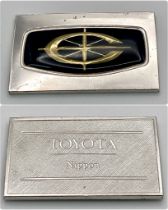 A STERLING SILVER TOYOTA NIPPON PLAQUE. 23.7g total weight.