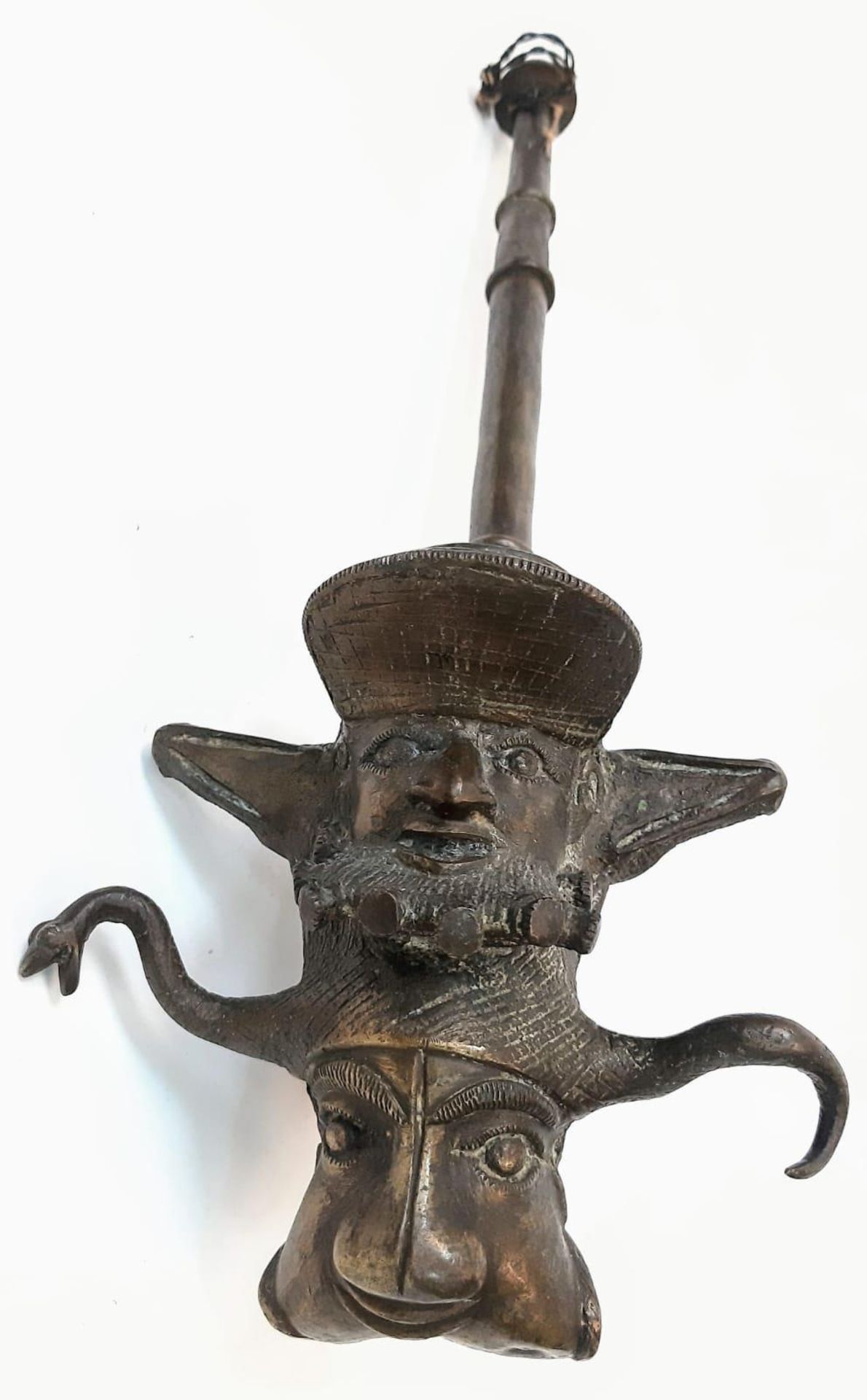 An Antique Bronze Two-Piece Pipe. Gothic, almost Satanic Decorative Base. 66cm length.