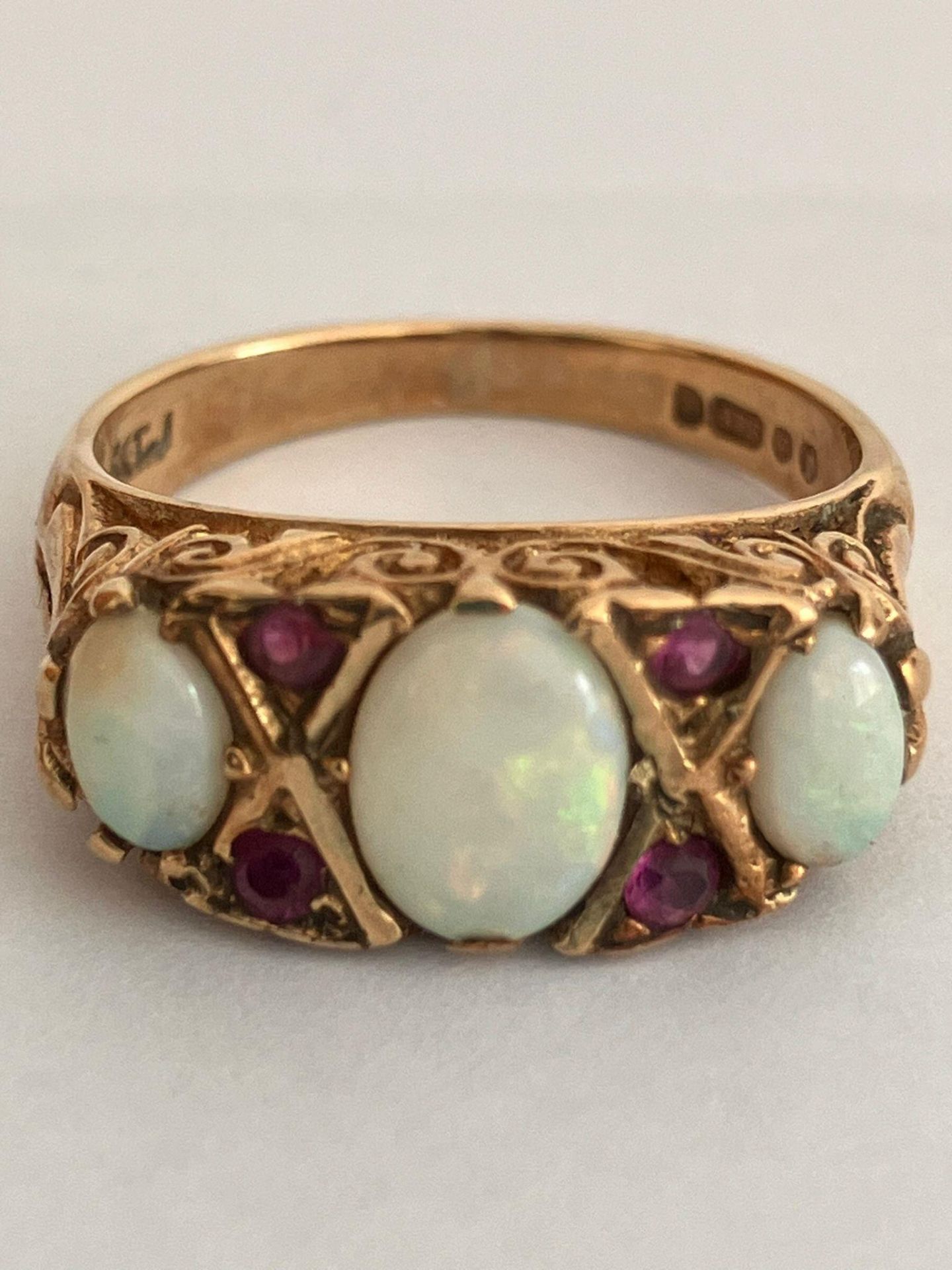 Vintage 9 carat YELLOW GOLD,OPAL and RUBY RING. Full UK hallmark. Complete with jewellers vintage