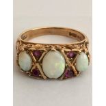 Vintage 9 carat YELLOW GOLD,OPAL and RUBY RING. Full UK hallmark. Complete with jewellers vintage