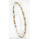 A Vintage 9K Yellow Gold and Diamond Spacer Crossover Link Bracelet. 18cm length. 2.37g total