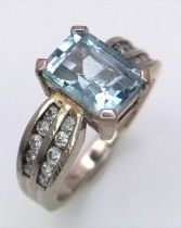 A 2ct AQUAMARINE STONE SET IN 18K WHITE GOLD WITH DIAMOND SHOULDERS , A REAL EYE CATCHER! 3.8gms