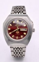 A Vintage Ricoh 21 Jewels Automatic Gents Watch. Stainless steel bracelet and case - 37mm. Red