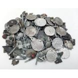 Over 200 + 3rd Reich Winterhilf Fund Raising Badges. They all have either pins or stones missing