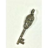 Diamond encrusted memento mori skull key pendant . 4.5cm .