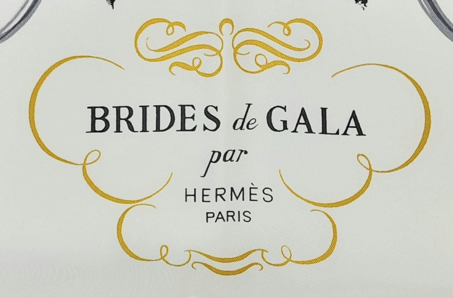 A Hermes Carre Silk Scarf "Brides de Gala" in Black, White and Gold Equestrian Print, features a - Image 3 of 5