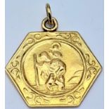 A 9K Yellow Gold St. Christopher Pendant. 2cm. 2.75g weight.