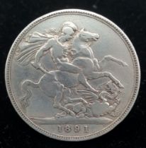 An 1891 Queen Victoria Silver Crown. VF grade but please see photos.