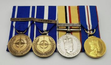 A modern group of four medals to the Royal Logistic Corps. Consisting of: NATO medal with clasp ‘