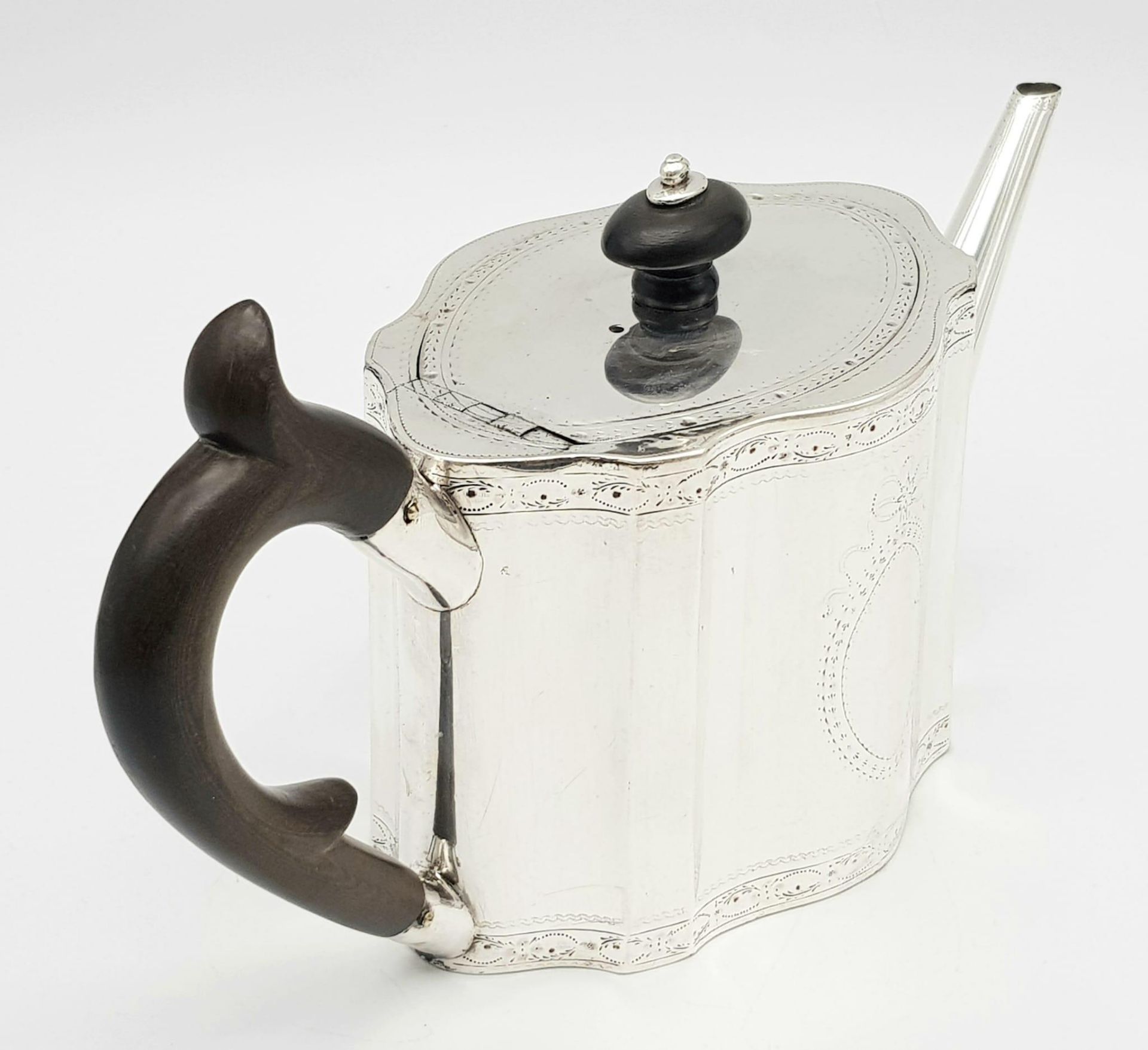 A 1785 Hester Bateman George III Silver Teapot. Oval form with empty cartouche to side. Minimalist - Image 2 of 11