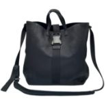 A Christopher Kane Black Tote Bag. Leather exterior with silver-toned hardware, two top handles,