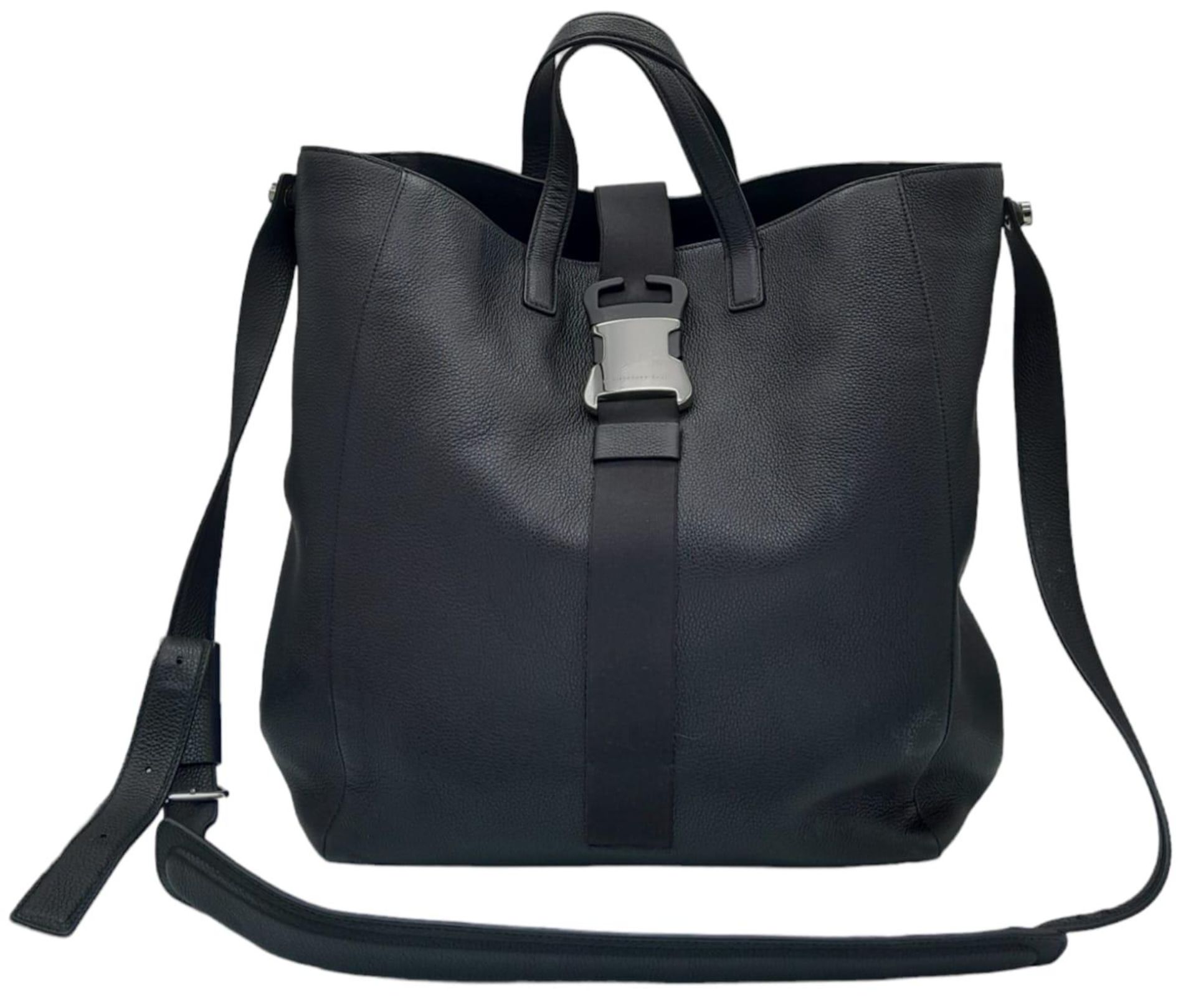 A Christopher Kane Black Tote Bag. Leather exterior with silver-toned hardware, two top handles,