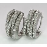 A PAIR OF 18K WHITE GOLD DIAMOND EARRINGS. TOTAL WEIGHT 9.8G