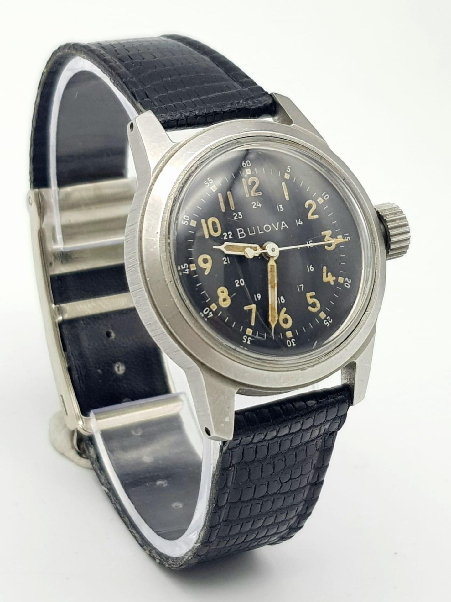 A U.S. MILITARY BULOVA MID SIZE QUARTZ WATCH ON BLACK LEATHER STRAP . 32mm