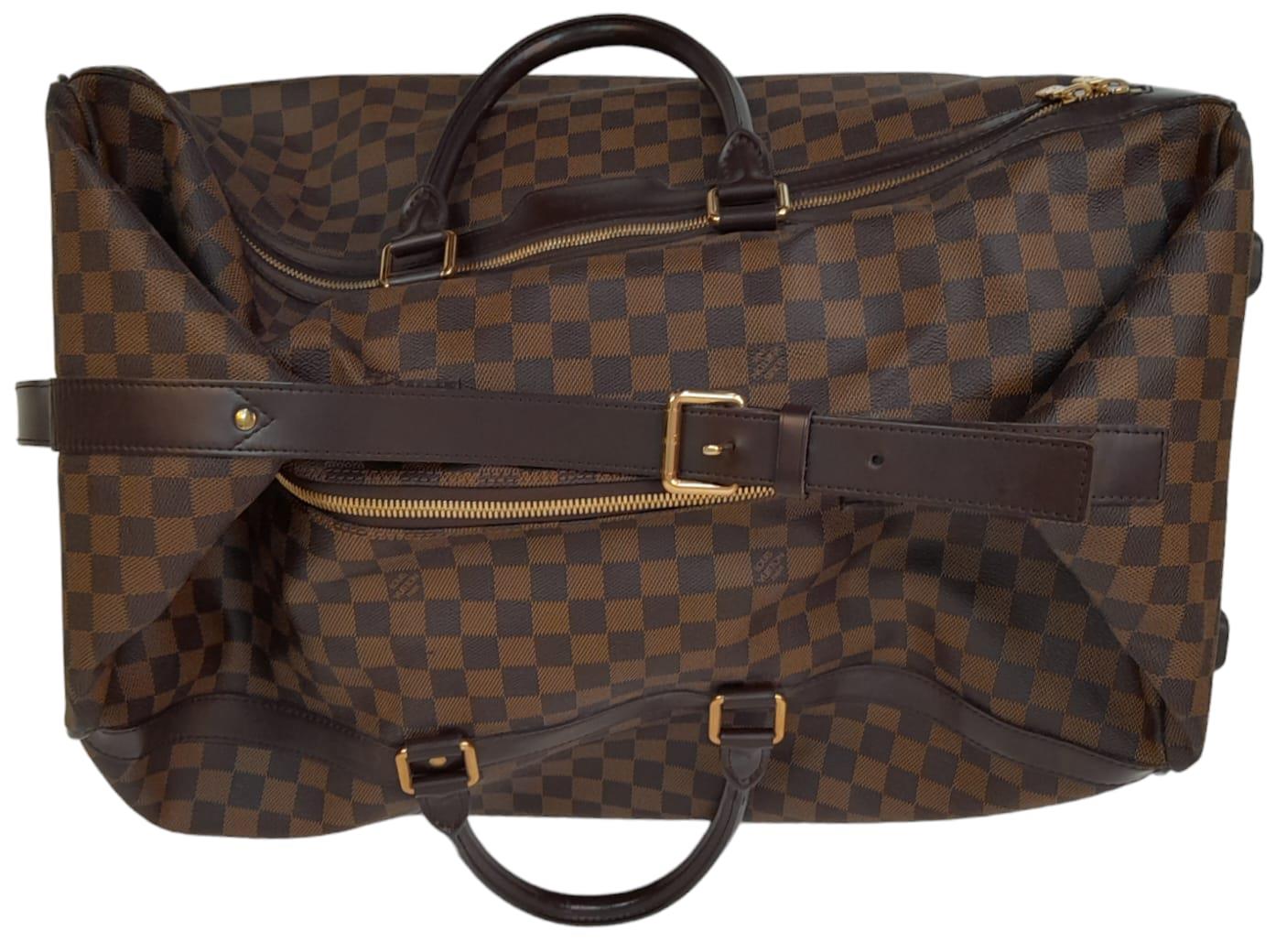 A Louis Vuitton Damier Ebene Eole Convertible Travel Bag. Leather exterior with gold-toned hardware, - Image 2 of 10