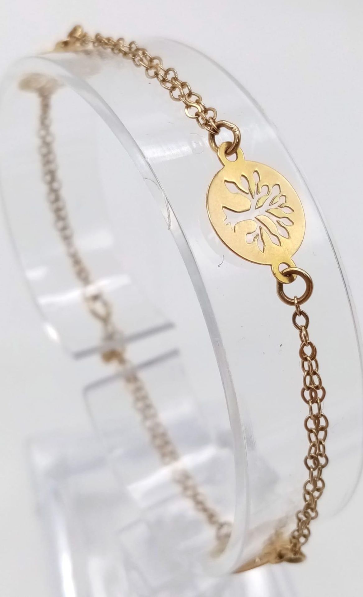 An 18K Yellow Gold Tree of Life Bracelet. 16cm. 2.2g weight. - Image 2 of 4