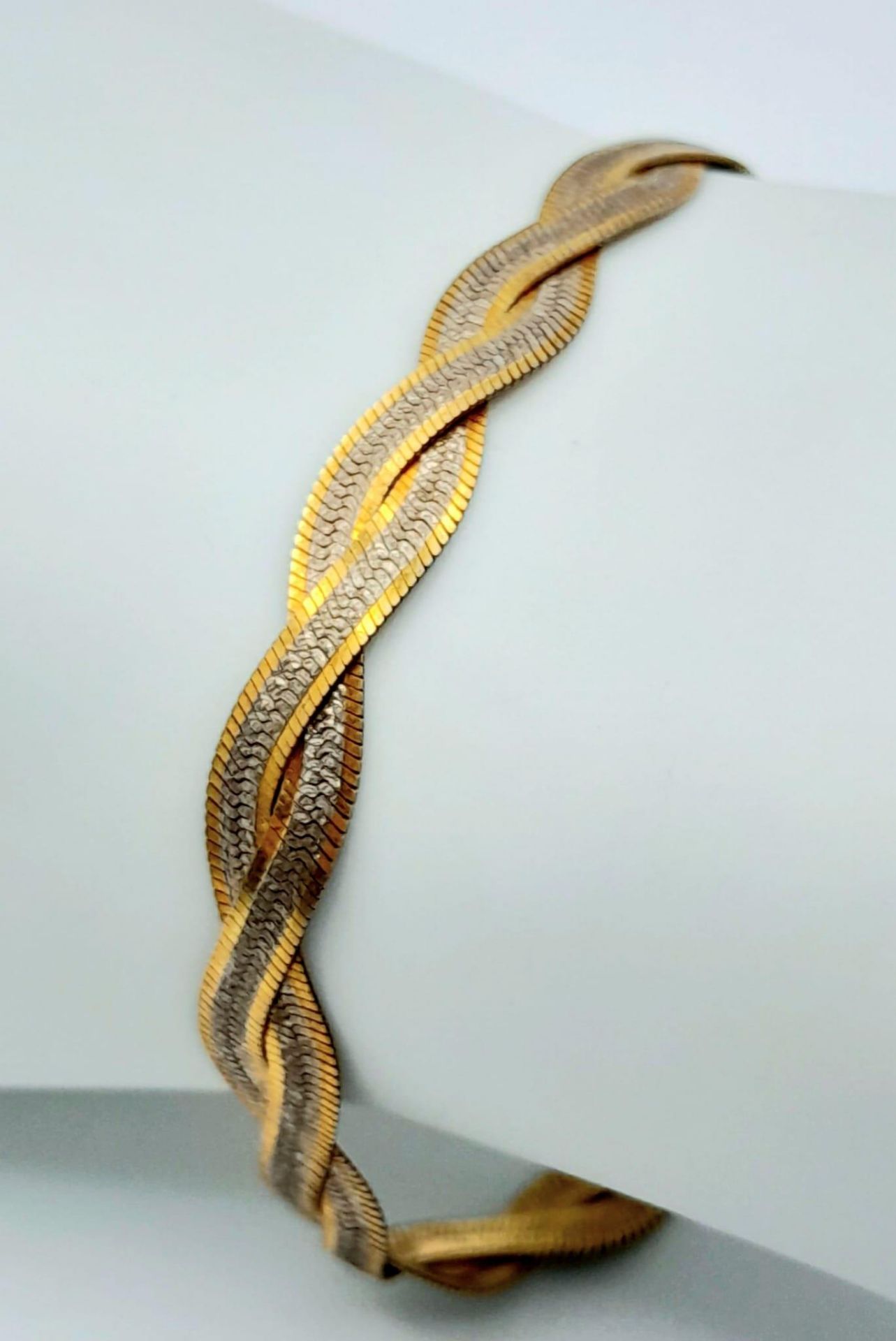 A 925 Sterling Silver Gilded and White Interwoven Flat Bracelet. 16cm.