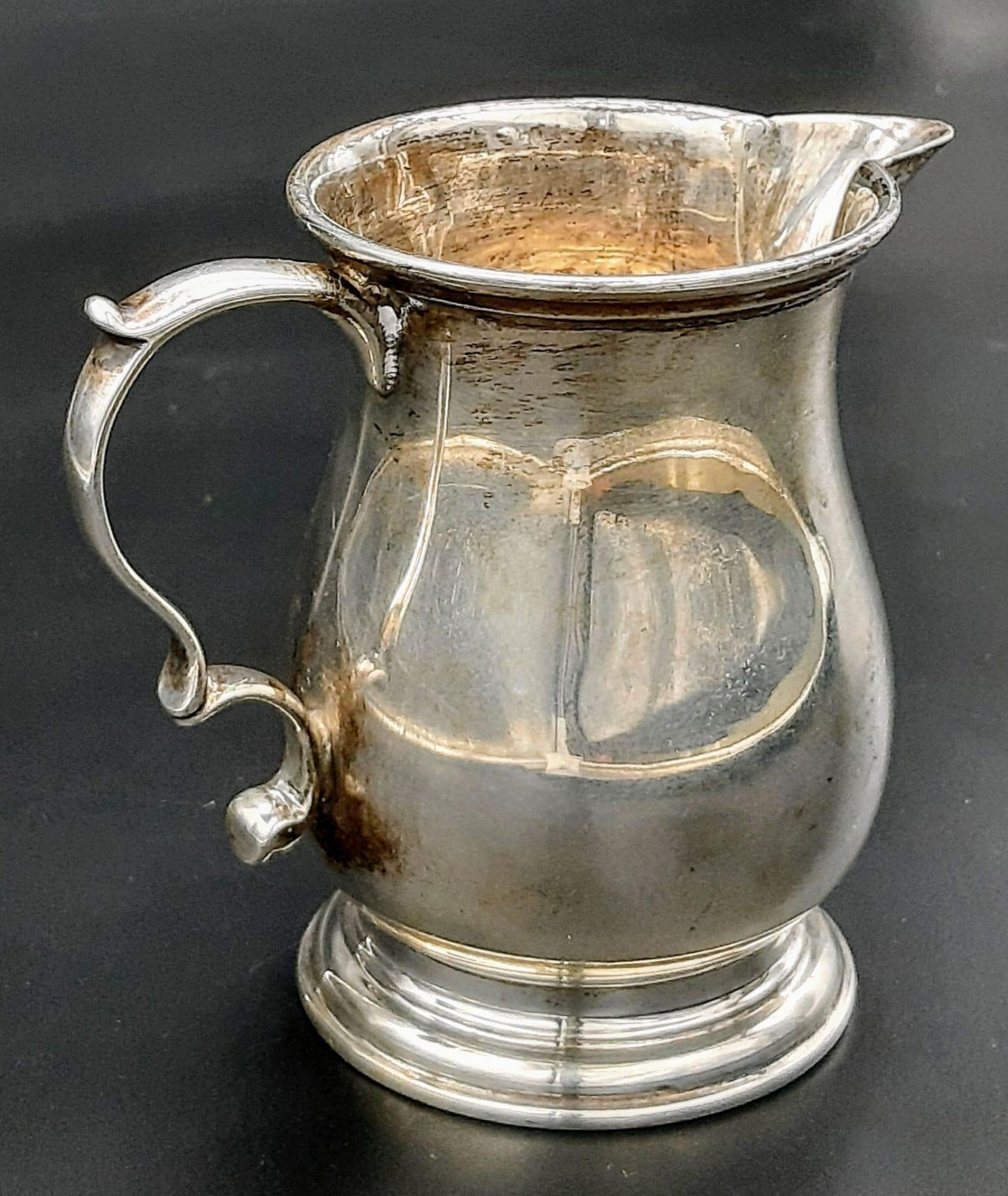 An Antique Sterling Silver Creamer Jug. Hallmarks for London 1924. Makers mark of Charles and - Image 2 of 4