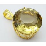 A Round Lemon Quartz Pendant set in Gold Plated 925 Silver. Weight - 20g. Lemon Quartz - 66.65ct.