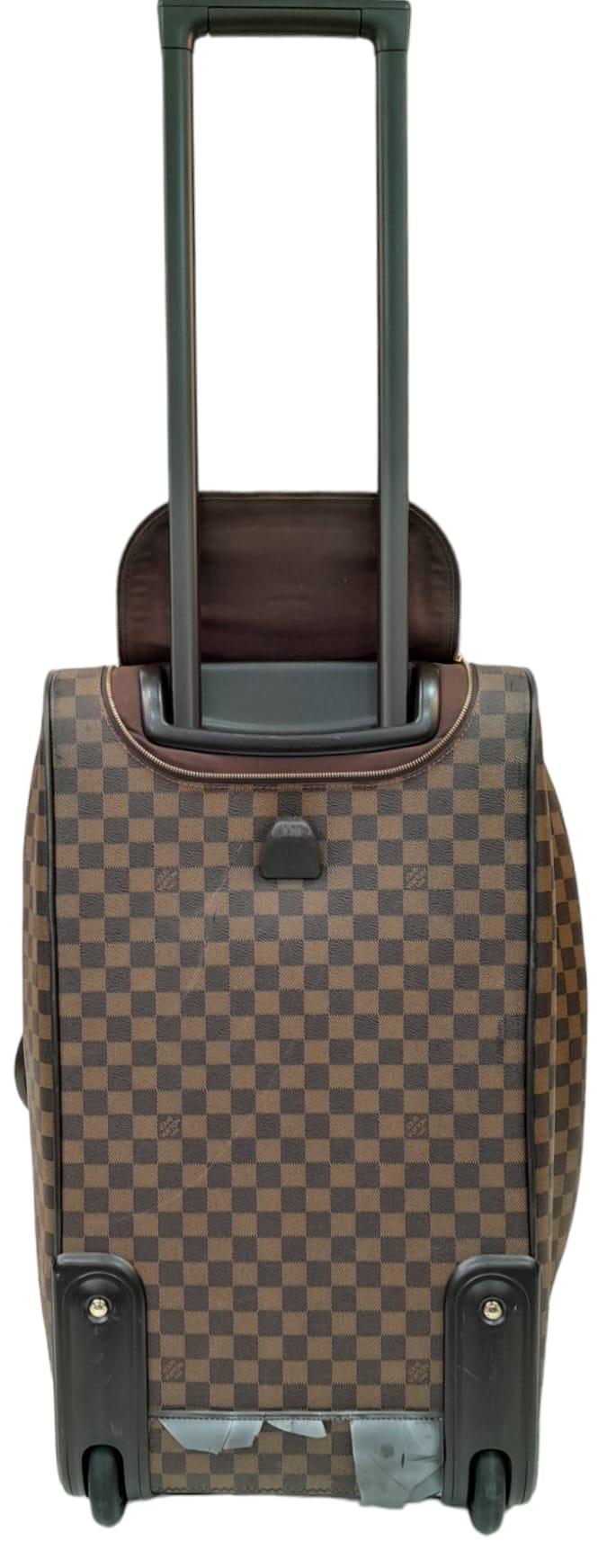A Louis Vuitton Damier Ebene Eole Convertible Travel Bag. Leather exterior with gold-toned hardware, - Image 5 of 10