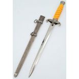 3rd Reich Late WW2 Unmarked Heer (Army) Officers Dagger. Orange celluloid grip, pommel and ferrule