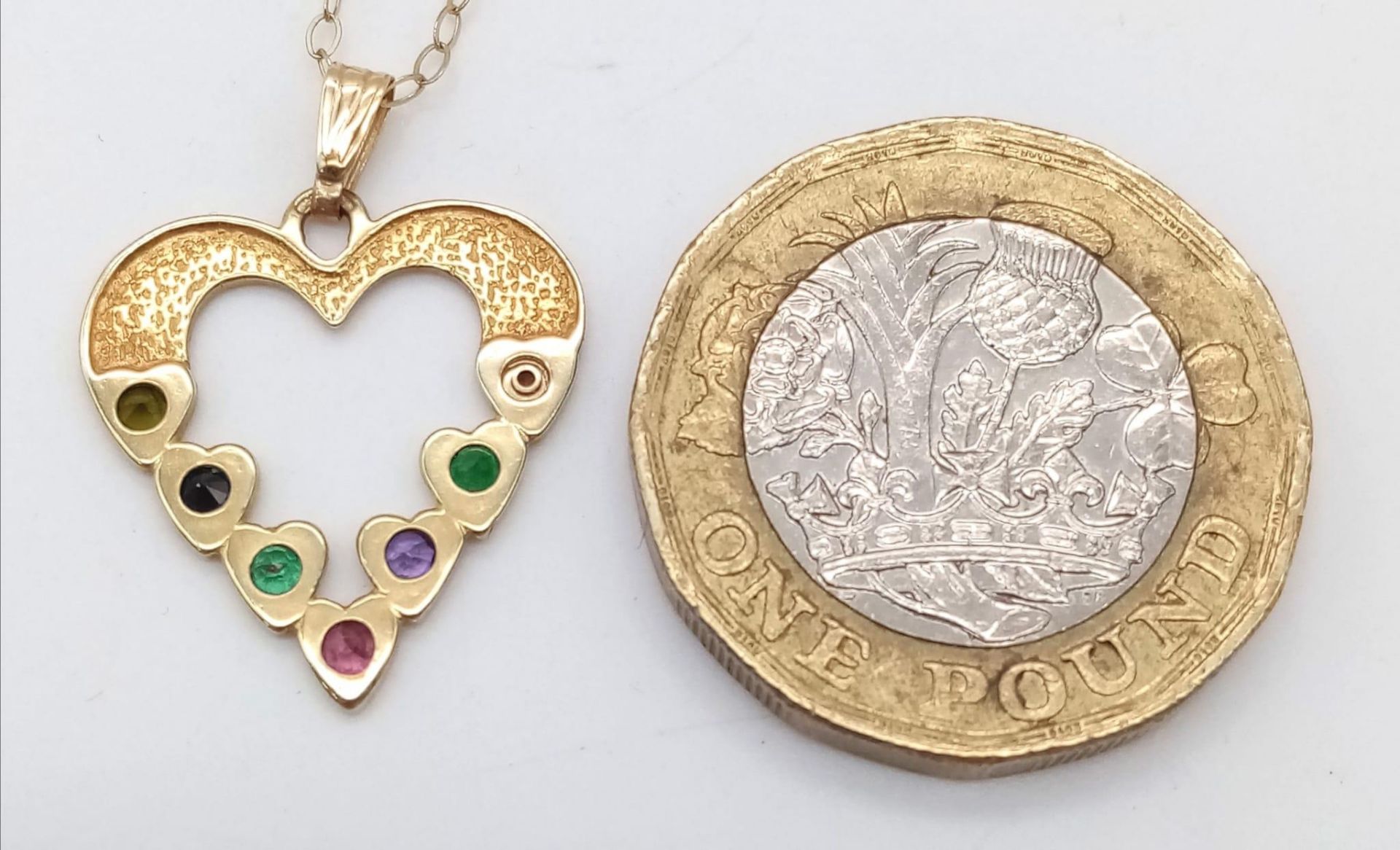 A 9K yellow gold 'DEAREST' heart necklace set with diamond, emeralds, amethyst, ruby, sapphire and - Image 4 of 5