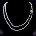 An Ethiopian Opal 2 Strand Necklace with an Aquamarine 925 Silver Pendant Clasp. Small colour-play