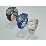 An Eclectic Three Quartz Watch Mix - Swarovski, Swatch and Capri Watch. All in working order.