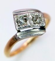 A Vintage 9K Yellow Gold Crossover Diamond Ring. Size N. 3g total weight.