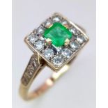 A VERY ATTRACTIVE 9K GOLD RING WITH CENTRAL EMERALDSURROUNDED BY WHITE ZIRCON STONES . 3.3gms size V