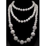 A Rope Length Graduated White Jade Bead Necklace. Perfect for different wearing arrangements.