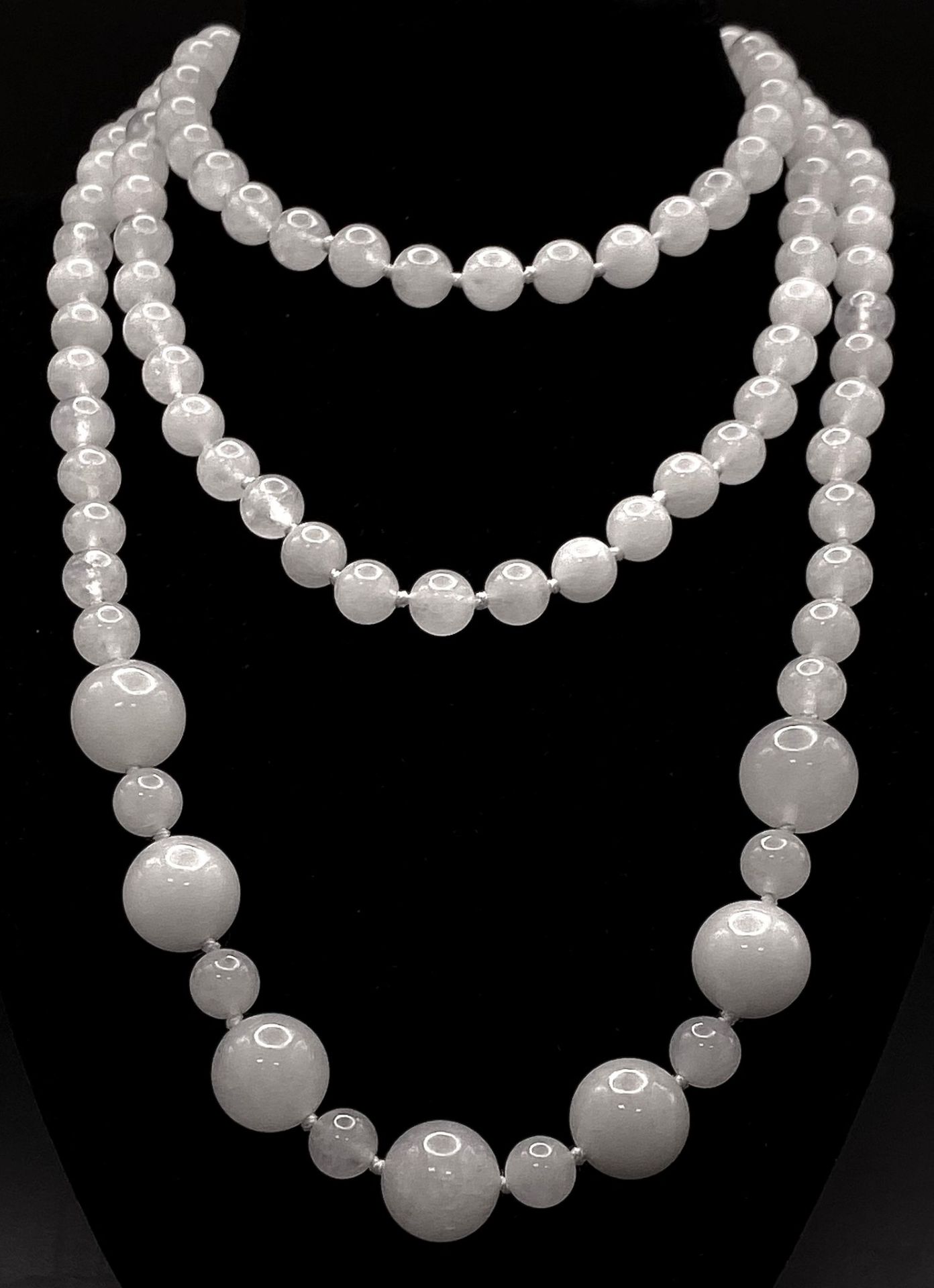 A Rope Length Graduated White Jade Bead Necklace. Perfect for different wearing arrangements.