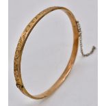 A Vintage 9K Rose Gold Bangle. Clip open design. 6cm inner diameter. 4.5g weight.