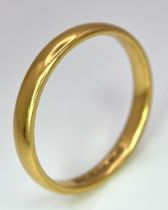 A 22k Yellow Gold Band Ring. 3mm width. 4g weight. Full UK hallmarks.