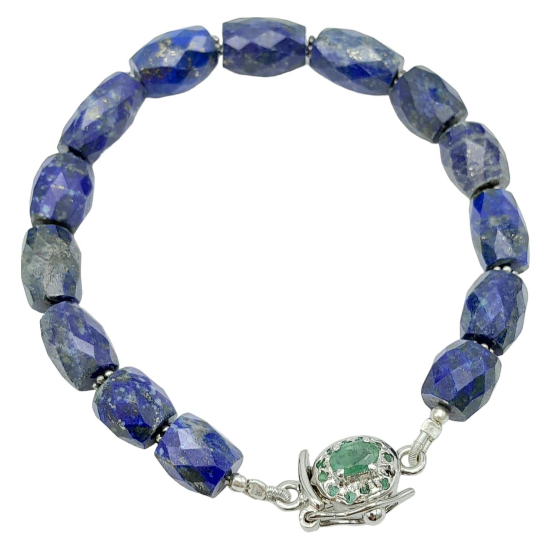A Lapis Lazuli Bracelet with Emerald and 925 Silver Clasp. 110ctw. 20.5cm length, 22.57g total