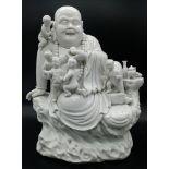 A Wonderful Large Chinese Blanc de Chine Budai - Laughing Budai seated with 5 small Children -