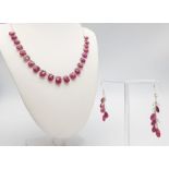 A 115ctw Ruby Teardrop Necklace with Moonstones and Matching Drop Earrings, Set on 925 Silver.