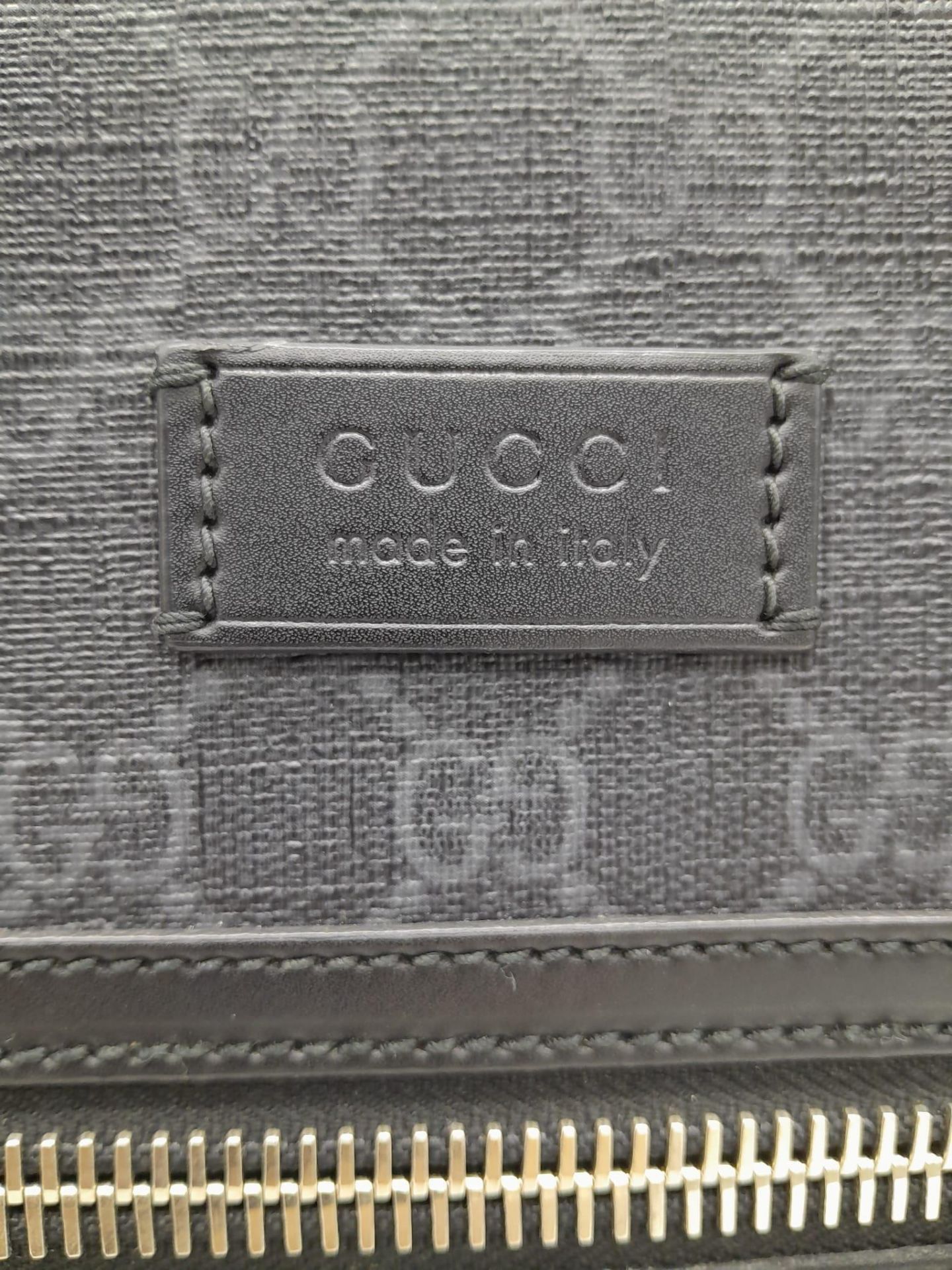 A Gucci Monogram Night Courier Messenger Bag. Leather exterior with patch details, silver-toned - Bild 10 aus 11