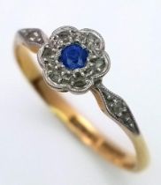 A VINTAGE 18K GOLD SAPPHIRE AND DIAMOND RING WITH PLATINUM SETTING . 1.9gms size O